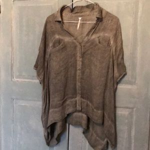 Free People Shirt in Distress Green Size Small it has a flaw so price to sell